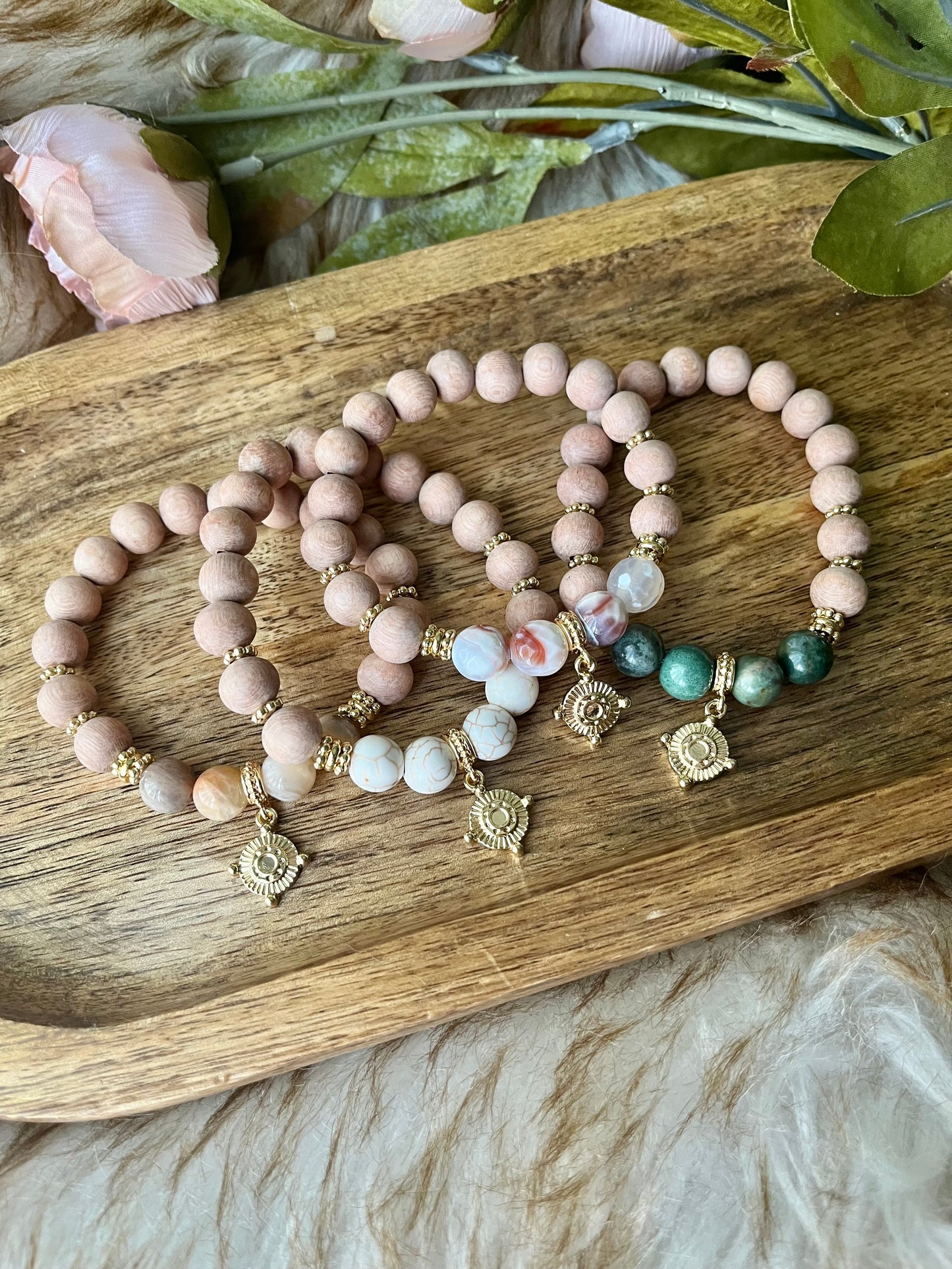 The Journey Forward Collection of Rosewood + Gemstone Compass Charm Bracelets